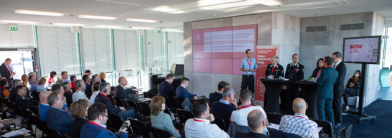 Audience at the EC conference 'Networked help' listen to a lecture